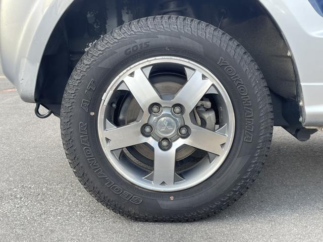 パジェロミニ ＶＲ　４ＷＤ　ＥＴＣ　ナビ　キーレスエントリー　電動格納ミラー　ＡＴ　盗難防止システム　ＡＢＳ　ＣＤ　ルーフレール　アルミホイール　衝突安全ボディ　エアコン　パワーステアリング　パワーウィンドウ（26枚目）