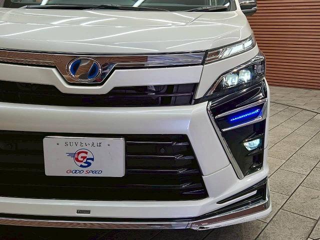 ヴォクシー ハイブリッドＺＳ　煌ＩＩ　モデリスタエアロ　フリップダウンモニター　両側電動スライドドア　シートヒーター　クルーズコントロール　クリアランスソナー　バックカメラ　スマートキー　プッシュスタート　オートエアコン　オートライト（22枚目）