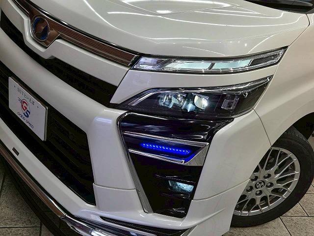 ヴォクシー ハイブリッドＺＳ　煌ＩＩ　モデリスタエアロ　フリップダウンモニター　両側電動スライドドア　シートヒーター　クルーズコントロール　クリアランスソナー　バックカメラ　スマートキー　プッシュスタート　オートエアコン　オートライト（23枚目）