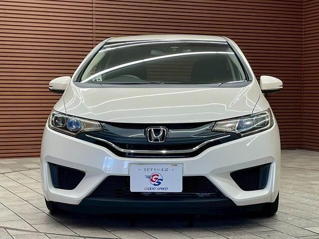 フィット 13G Fパッケージ 社外ナビ スマートキー プッシュスタート アイドリングストップ 横滑り防止装置 オートライト エアコン(17枚目)