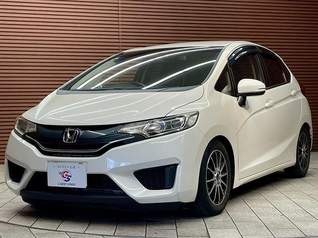 フィット 13G Fパッケージ 社外ナビ スマートキー プッシュスタート アイドリングストップ 横滑り防止装置 オートライト エアコン(31枚目)