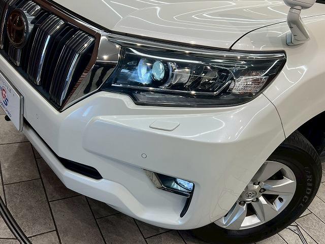 ランドクルーザープラド ＴＸ　禁煙車　レーダークルーズコントロール　クリアランスソナー　フロントカメラ　スマートキー　プッシュスタート　ＬＥＤヘッドライト　純正ナビ　横滑り防止装置　オートエアコン　オートマチックハイビーム　ＥＴＣ（23枚目）