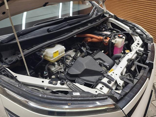 ヴォクシー ハイブリッドＶ　純正地デジナビ　バックカメラ　フリップダウンモニター　両側電動ドア　シートヒーター　クルーズコントロール　モデリスタエアロ　ＥＴＣ　ステアリングリモコン　オートエアコン　パワーウインドウ（21枚目）