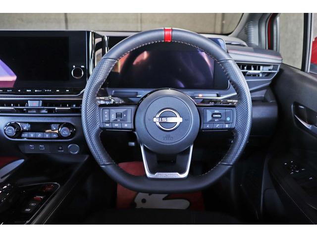 オーラ ニスモ　車検整備付／純正９インチナビＴＶ／プロパイロット／ＢＯＳＥサウンドシステム／全周囲カメラ／ワイヤレス充電／合皮コンビシート／ブラックルーフ／ステアリングヒーター／デジタルルームミラー／ＥＴＣ２．０（29枚目）