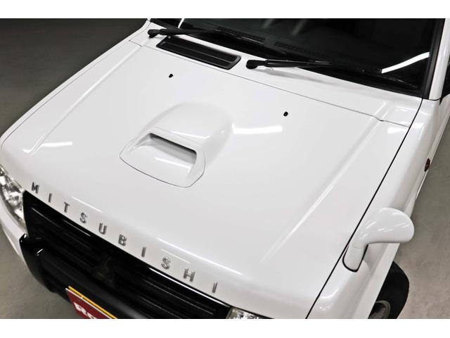 パジェロミニ ナビエディションVR 4WD/ターボエンジン/10.1インチディスプレイオーディオ/LEDヘッドライト/デジタルインナーミラー/純正15インチAW/前後ドラレコ/シートカバー/禁煙車/パワーウインドウ/パワーステアリング(11枚目)