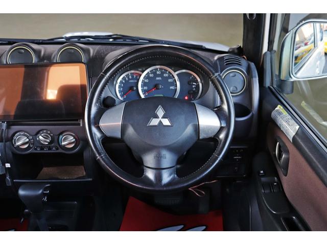 パジェロミニ ナビエディションVR 4WD/ターボエンジン/10.1インチディスプレイオーディオ/LEDヘッドライト/デジタルインナーミラー/純正15インチAW/前後ドラレコ/シートカバー/禁煙車/パワーウインドウ/パワーステアリング(26枚目)