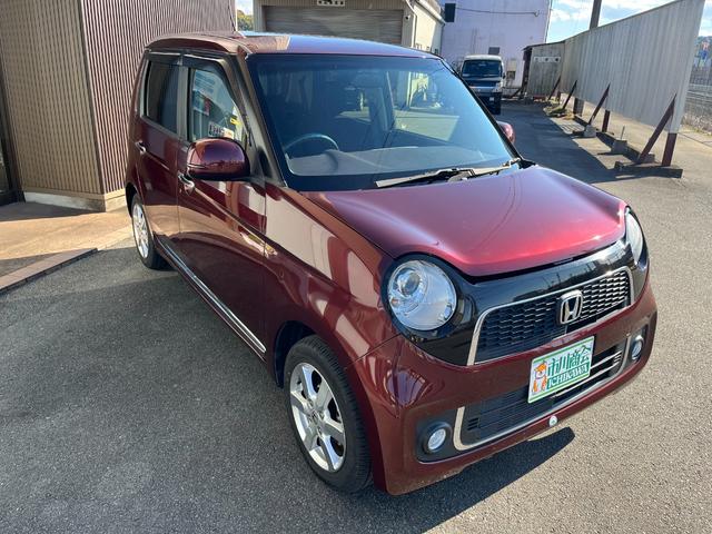 N-ONE プレミアム・Lパッケージ HIDヘッドランプ スマートキー プッシュスタート 社外ナビTV 電格ミラー トップシェイドガラス 純正14インチアルミ リアスポイラー レザーステアリング ドアバイザー フロアマット(3枚目)