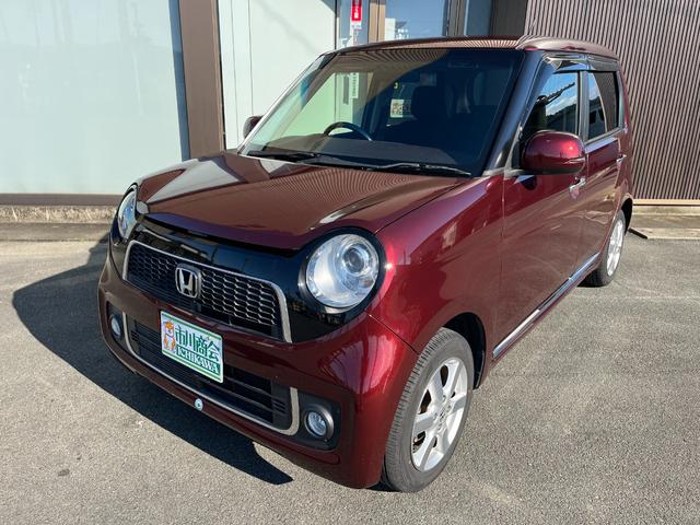 N-ONE プレミアム・Lパッケージ HIDヘッドランプ スマートキー プッシュスタート 社外ナビTV 電格ミラー トップシェイドガラス 純正14インチアルミ リアスポイラー レザーステアリング ドアバイザー フロアマット(4枚目)