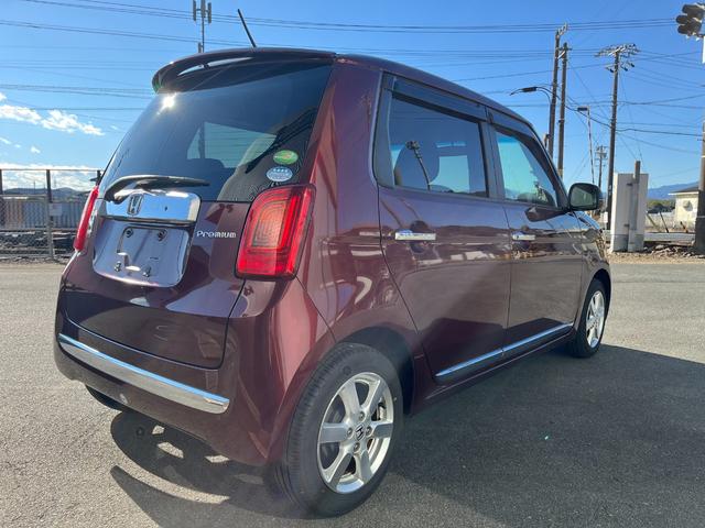 N-ONE プレミアム・Lパッケージ HIDヘッドランプ スマートキー プッシュスタート 社外ナビTV 電格ミラー トップシェイドガラス 純正14インチアルミ リアスポイラー レザーステアリング ドアバイザー フロアマット(10枚目)