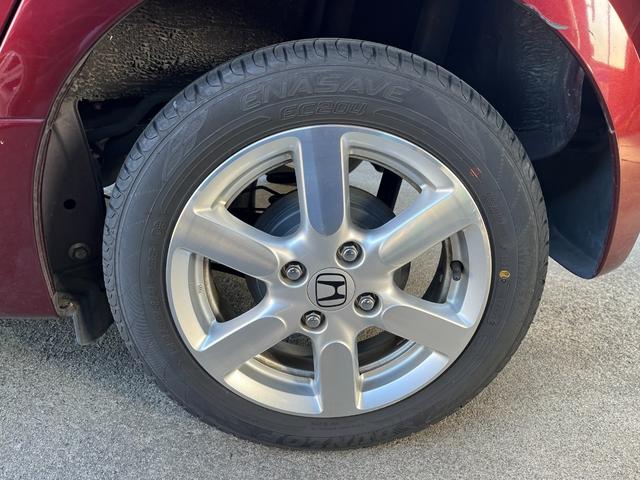 N-ONE プレミアム・Lパッケージ HIDヘッドランプ スマートキー プッシュスタート 社外ナビTV 電格ミラー トップシェイドガラス 純正14インチアルミ リアスポイラー レザーステアリング ドアバイザー フロアマット(35枚目)