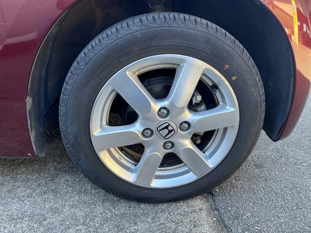 N-ONE プレミアム・Lパッケージ HIDヘッドランプ スマートキー プッシュスタート 社外ナビTV 電格ミラー トップシェイドガラス 純正14インチアルミ リアスポイラー レザーステアリング ドアバイザー フロアマット(36枚目)