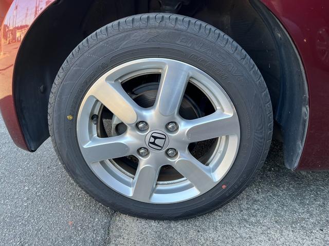 N-ONE プレミアム・Lパッケージ HIDヘッドランプ スマートキー プッシュスタート 社外ナビTV 電格ミラー トップシェイドガラス 純正14インチアルミ リアスポイラー レザーステアリング ドアバイザー フロアマット(37枚目)