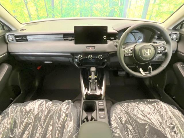 ヴェゼル ｅ：ＨＥＶ　Ｚ　登録済未使用車　メーカー９型ナビ　バックカメラ　コーナーセンサー　置くだけ充電　パワーバックドア　ブラインドスポットモニター　レーダークルーズ　ＬＥＤヘッドライト　ホンダセンシング　シートヒーター（2枚目）