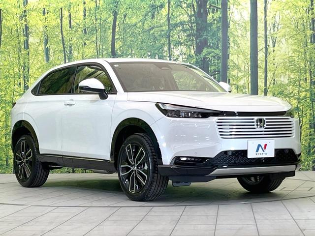 ヴェゼル ｅ：ＨＥＶ　Ｚ　登録済未使用車　メーカー９型ナビ　バックカメラ　コーナーセンサー　置くだけ充電　パワーバックドア　ブラインドスポットモニター　レーダークルーズ　ＬＥＤヘッドライト　ホンダセンシング　シートヒーター（16枚目）