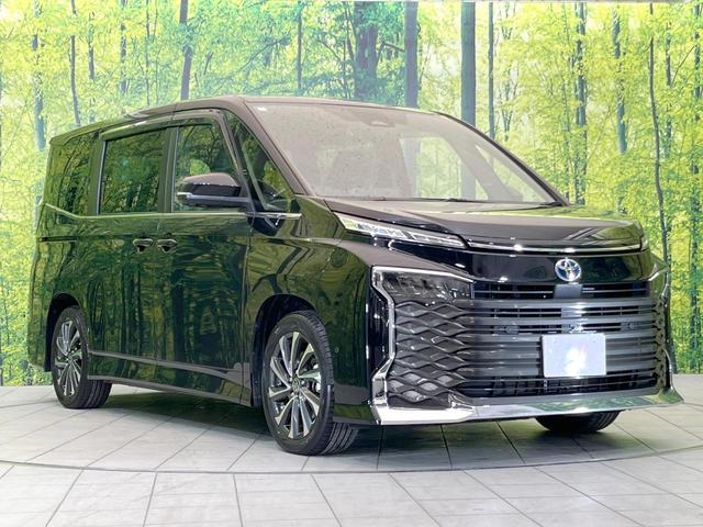 ヴォクシー ハイブリッドS-Z 14型後席モニター 10.5型純正ナビ 両側電動ドア 全周囲カメラ 電動リアゲート 後席オットマン 自働駐車 ETC レーダークルコン 衝突軽減 シートヒーター オートハイビーム LEDヘッドライト(55枚目)