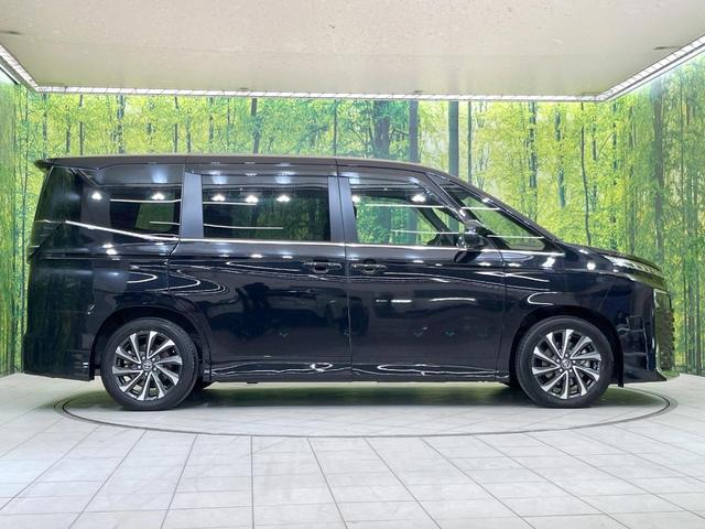 ヴォクシー ハイブリッドS-Z 14型後席モニター 10.5型純正ナビ 両側電動ドア 全周囲カメラ 電動リアゲート 後席オットマン 自働駐車 ETC レーダークルコン 衝突軽減 シートヒーター オートハイビーム LEDヘッドライト(57枚目)