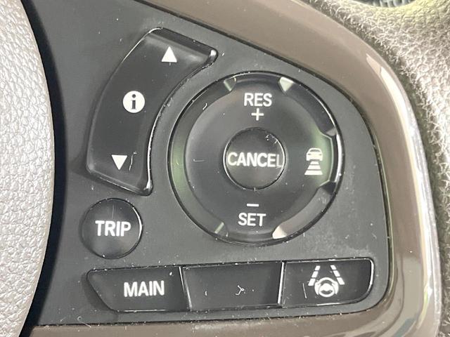 N-WGN Lホンダセンシング 純正SDナビ バックカメラ 禁煙車 ホンダセンシング レーダークルーズ ETC ドラレコ クリアランスソナー スマートキー シートヒーター オートライト CD再生 Bluetooth 電動格納ミラー(5枚目)