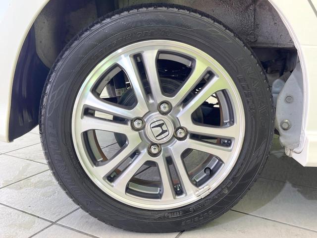 Ｎ－ＢＯＸカスタム Ｇ・Ａパッケージ　純正ＳＤナビ　禁煙車　衝突軽減システム　電動スライド　ＥＴＣ　ＨＩＤヘッド　スマートキー　Ｂｌｕｅｔｏｏｔｈ　　オートライト　オートエアコン　プライバシーガラス　パワーウィンドウ　盗難防止システム（13枚目）