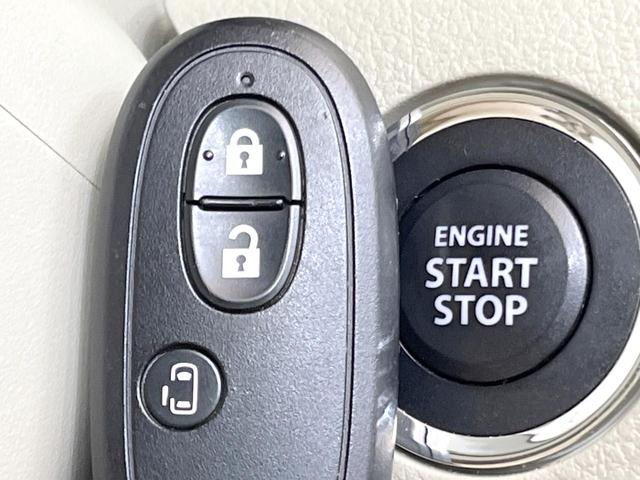 スペーシア Ｘ　ＳＤナビ　パワースライドドア　禁煙車　スマートキー　オートエアコン　アイドリングストップ　ＣＤ／ＤＶＤ再生　ドアバイザー　ＴＶ　ロールシェード　盗難防止システム　電動格納ミラー　ベンチシート（5枚目）