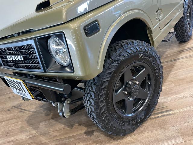 ジムニー ＥＣ　パノラミックルーフ　インタークーラーターボ　４ＷＤ　ＭＯＭＯステアリング　ＧＥＯＬＡＮＤＡＲ　Ｍ／Ｔ　１ＤＩＮオーディオ　リフトアップ　スモークサイドマーカー　　ＥＴＣ　検Ｒ７年１月まで（60枚目）