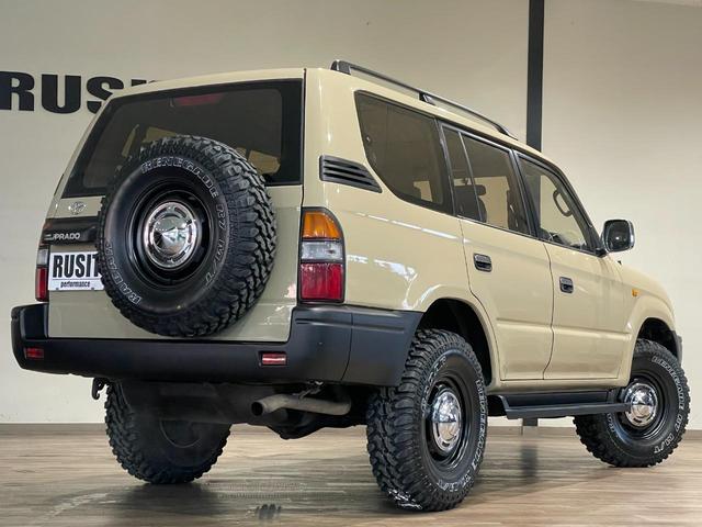 ランドクルーザープラド ＴＸ　サンドベージュ全塗装　４ＷＤ　丸目ヘッドライト　オレンジコーナーレンズ　ＴＯＹＯＴＡエンブレム　社外ホイール　ＲＥＮＥＧＡＤＥ　Ｍ／Ｔ新品タイヤ　背面タイヤ　サイドステップ（11枚目）