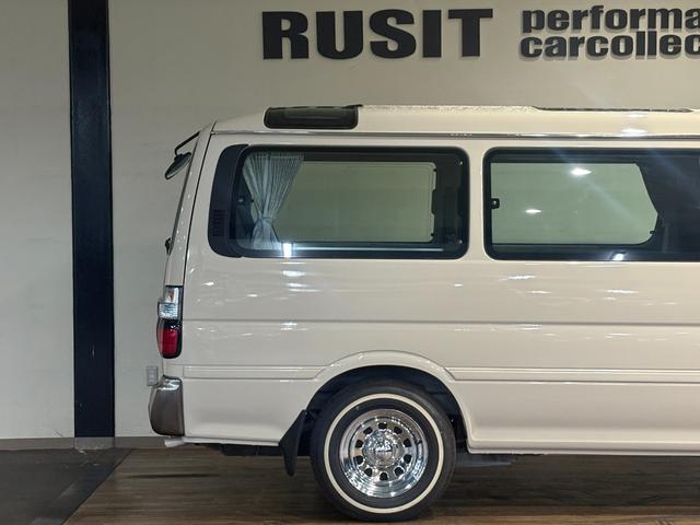 ハイエースワゴン スーパーカスタムG クリームカラー全塗装済み デイトナホイール新品 フルフラット 社外ナビ取付済み 新品ホワイトリボンタイヤ バンパーメッキ調塗装済み カリフォルニアミラー取付済み(64枚目)