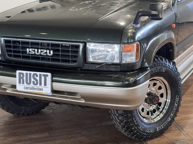 ビッグホーン ハンドリングバイロータスＳＥ　ロング　オリジナルカラー　ＮＯＸ適合車輌　４ＷＤ車輌　デイトナメッキホイール　ＲＥＮＥＧＡＤＥ新品タイヤ　いすゞエンブレム　リアラダー　シートヒーター　タイミングベルト交換済み１１０５５７ｋｍ時点（56枚目）