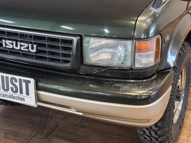 ビッグホーン ハンドリングバイロータスＳＥ　ロング　オリジナルカラー　ＮＯＸ適合車輌　４ＷＤ車輌　デイトナメッキホイール　ＲＥＮＥＧＡＤＥ新品タイヤ　いすゞエンブレム　リアラダー　シートヒーター　タイミングベルト交換済み１１０５５７ｋｍ時点（58枚目）