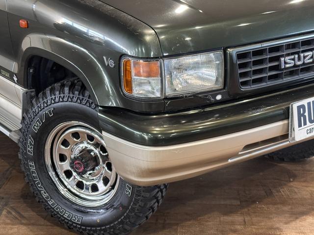 ビッグホーン ハンドリングバイロータスＳＥ　ロング　オリジナルカラー　ＮＯＸ適合車輌　４ＷＤ車輌　デイトナメッキホイール　ＲＥＮＥＧＡＤＥ新品タイヤ　いすゞエンブレム　リアラダー　シートヒーター　タイミングベルト交換済み１１０５５７ｋｍ時点（65枚目）