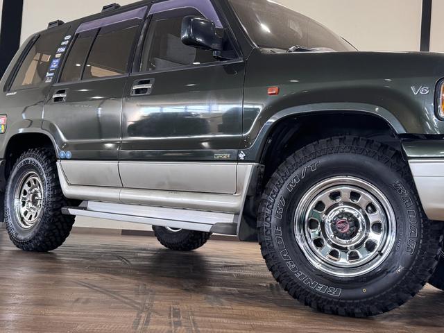 ビッグホーン ハンドリングバイロータスＳＥ　ロング　オリジナルカラー　ＮＯＸ適合車輌　４ＷＤ車輌　デイトナメッキホイール　ＲＥＮＥＧＡＤＥ新品タイヤ　いすゞエンブレム　リアラダー　シートヒーター　タイミングベルト交換済み１１０５５７ｋｍ時点（66枚目）