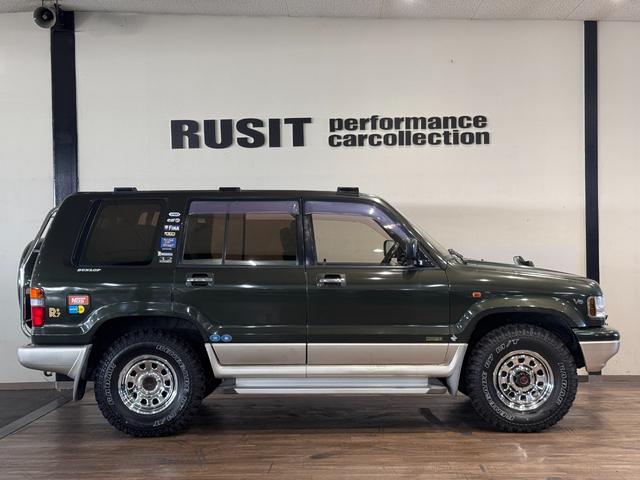 ビッグホーン ハンドリングバイロータスＳＥ　ロング　オリジナルカラー　ＮＯＸ適合車輌　４ＷＤ車輌　デイトナメッキホイール　ＲＥＮＥＧＡＤＥ新品タイヤ　いすゞエンブレム　リアラダー　シートヒーター　タイミングベルト交換済み１１０５５７ｋｍ時点（69枚目）