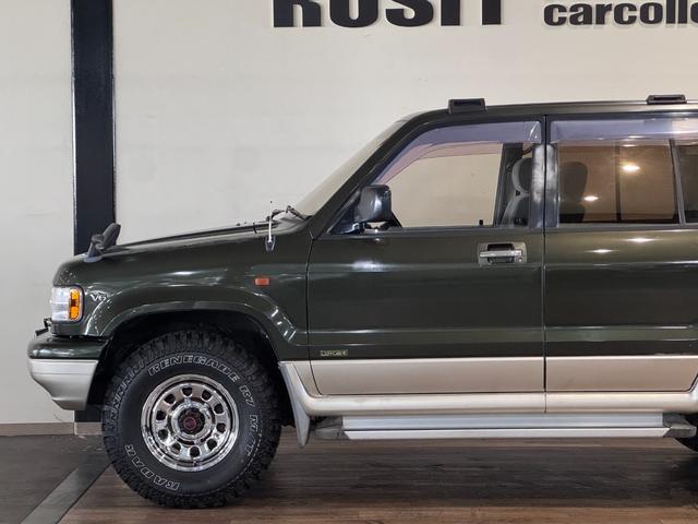 ビッグホーン ハンドリングバイロータスＳＥ　ロング　オリジナルカラー　ＮＯＸ適合車輌　４ＷＤ車輌　デイトナメッキホイール　ＲＥＮＥＧＡＤＥ新品タイヤ　いすゞエンブレム　リアラダー　シートヒーター　タイミングベルト交換済み１１０５５７ｋｍ時点（74枚目）