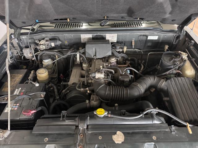 ビッグホーン ハンドリングバイロータスＳＥ　ロング　オリジナルカラー　ＮＯＸ適合車輌　４ＷＤ車輌　デイトナメッキホイール　ＲＥＮＥＧＡＤＥ新品タイヤ　いすゞエンブレム　リアラダー　シートヒーター　タイミングベルト交換済み１１０５５７ｋｍ時点（75枚目）