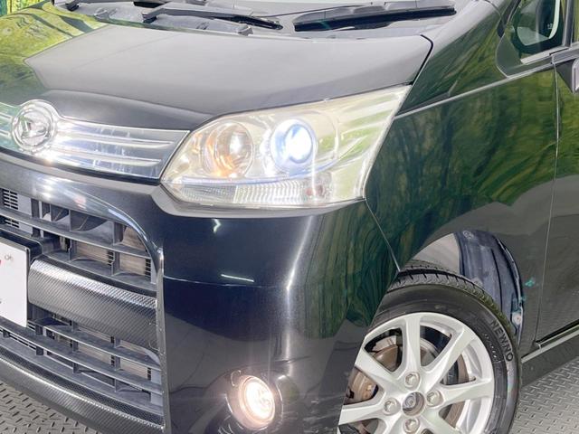 ムーヴ カスタム　Ｘリミテッド　純正ナビ　バックカメラ　禁煙車　スマートキー　ＨＩＤヘッドライト　オートエアコン　純正１４インチアルミ　ＣＤ　地デジ　プライバシーガラス　ドアバイザー　盗難防止システム（12枚目）