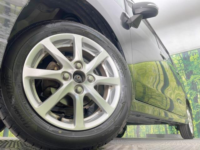 ムーヴ カスタム　Ｘリミテッド　純正ナビ　バックカメラ　禁煙車　スマートキー　ＨＩＤヘッドライト　オートエアコン　純正１４インチアルミ　ＣＤ　地デジ　プライバシーガラス　ドアバイザー　盗難防止システム（13枚目）