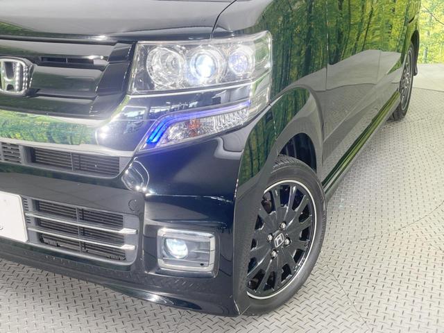 Ｎ－ＢＯＸカスタム Ｇ　ターボＳＳブラックスタイルパッケージ　両側電動ドア　ＳＤナビ　バックカメラ　衝突被害軽減システム　禁煙車　スマートキー　ＨＩＤヘッド　ビルトインＥＴＣ　クルコン　オートライト　オートエアコン　純正１５インチアルミ（12枚目）