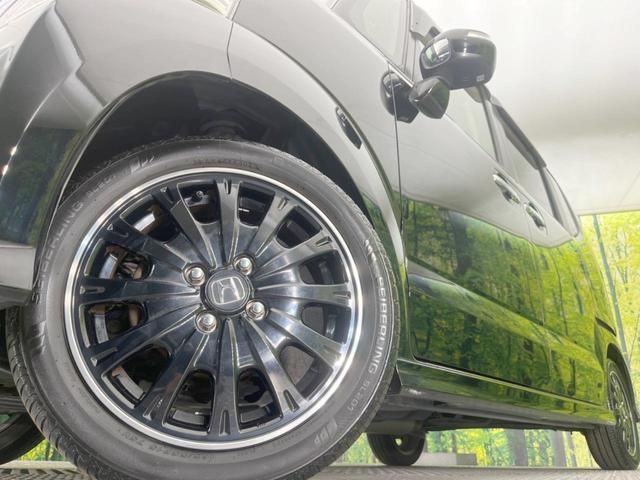 Ｎ－ＢＯＸカスタム Ｇ　ターボＳＳブラックスタイルパッケージ　両側電動ドア　ＳＤナビ　バックカメラ　衝突被害軽減システム　禁煙車　スマートキー　ＨＩＤヘッド　ビルトインＥＴＣ　クルコン　オートライト　オートエアコン　純正１５インチアルミ（13枚目）