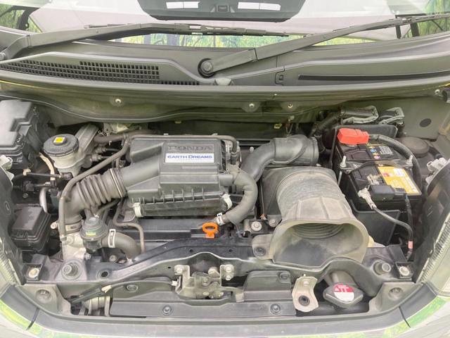 Ｎ－ＢＯＸカスタム Ｇ　ターボＳＳブラックスタイルパッケージ　両側電動ドア　ＳＤナビ　バックカメラ　衝突被害軽減システム　禁煙車　スマートキー　ＨＩＤヘッド　ビルトインＥＴＣ　クルコン　オートライト　オートエアコン　純正１５インチアルミ（18枚目）