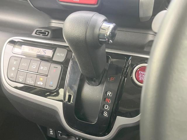 Ｎ－ＢＯＸカスタム Ｇ　ターボＳＳブラックスタイルパッケージ　両側電動ドア　ＳＤナビ　バックカメラ　衝突被害軽減システム　禁煙車　スマートキー　ＨＩＤヘッド　ビルトインＥＴＣ　クルコン　オートライト　オートエアコン　純正１５インチアルミ（24枚目）