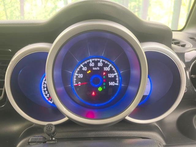 Ｎ－ＢＯＸカスタム Ｇ　ターボＳＳブラックスタイルパッケージ　両側電動ドア　ＳＤナビ　バックカメラ　衝突被害軽減システム　禁煙車　スマートキー　ＨＩＤヘッド　ビルトインＥＴＣ　クルコン　オートライト　オートエアコン　純正１５インチアルミ（25枚目）