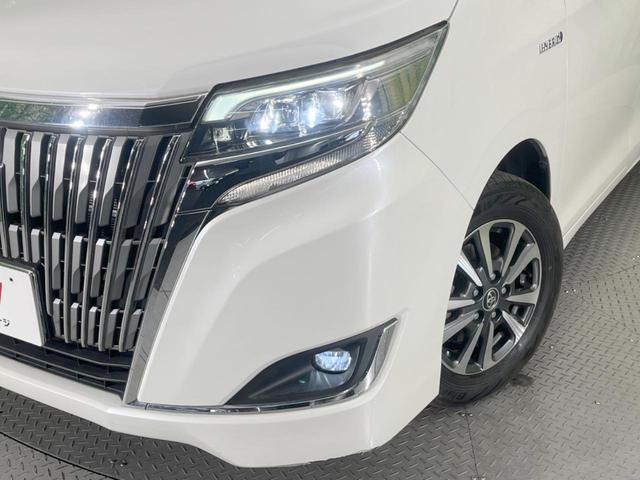 エスクァイア ハイブリッドＧｉ　プレミアムパッケージ　両側電動ドア　純正１０型ナビ　後席モニター　バックカメラ　衝突被害軽減システム　禁煙車　シートヒーター　コーナーセンサー　スマートキー　ＬＥＤヘッド　ビルトインＥＴＣ　クルコン　オートハイビーム（13枚目）