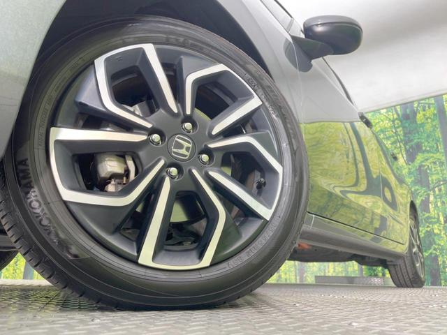 フィット ｅ：ＨＥＶホーム　純正ＳＤナビ　バックカメラ　ホンダセンシング　レーダークルーズ　禁煙車　ドラレコ　コーナーセンサー　スマートキー　ＬＥＤヘッド　ビルトインＥＴＣ　オートハイビーム　車線逸脱警報　オートライト（13枚目）