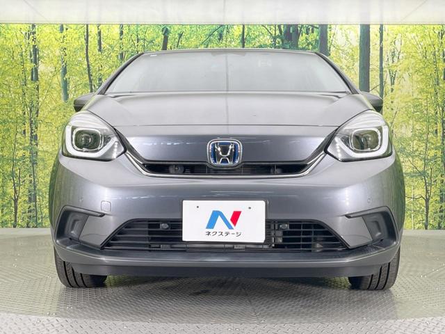 フィット ｅ：ＨＥＶホーム　純正ＳＤナビ　バックカメラ　ホンダセンシング　レーダークルーズ　禁煙車　ドラレコ　コーナーセンサー　スマートキー　ＬＥＤヘッド　ビルトインＥＴＣ　オートハイビーム　車線逸脱警報　オートライト（14枚目）
