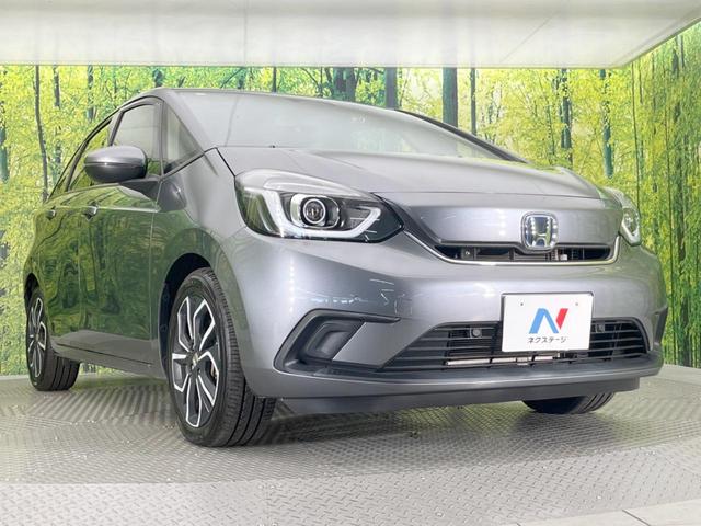 フィット ｅ：ＨＥＶホーム　純正ＳＤナビ　バックカメラ　ホンダセンシング　レーダークルーズ　禁煙車　ドラレコ　コーナーセンサー　スマートキー　ＬＥＤヘッド　ビルトインＥＴＣ　オートハイビーム　車線逸脱警報　オートライト（16枚目）
