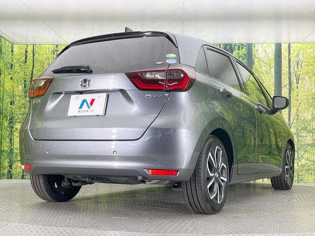 フィット ｅ：ＨＥＶホーム　純正ＳＤナビ　バックカメラ　ホンダセンシング　レーダークルーズ　禁煙車　ドラレコ　コーナーセンサー　スマートキー　ＬＥＤヘッド　ビルトインＥＴＣ　オートハイビーム　車線逸脱警報　オートライト（17枚目）