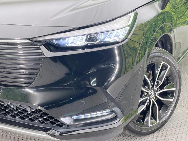 ヴェゼル ｅ：ＨＥＶ　Ｚ　純正ＳＤナビ　バックカメラ　衝突被害軽減システム　レーダークルーズ　禁煙車　電動リアゲート　ハーフレザーシート　コーナーセンサー　スマートキー　ＬＥＤヘッド　ビルトインＥＴＣ　オートハイビーム（12枚目）