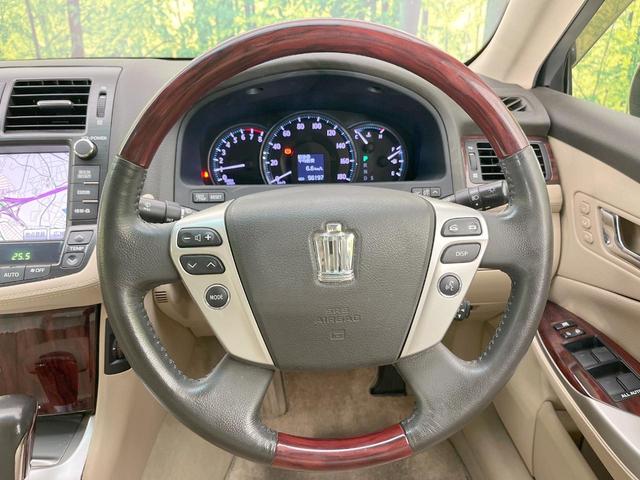 クラウン 2.5ロイヤルサルーン アニバーサリーED 純正ナビ バックカメラ 禁煙車 レザーシート シートクーラー シートヒーター スマートキー HIDヘッドライト ETC クルコン オートライト デュアルエアコン 純正17インチアルミ CD フルセグ(11枚目)