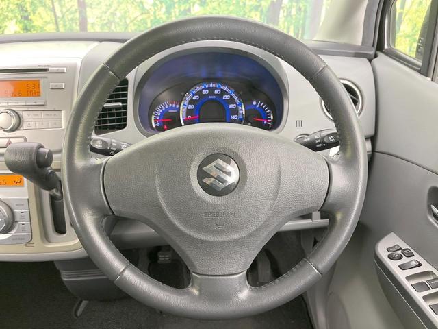 ワゴンＲ ＦＸリミテッドＩＩ　禁煙車　スマートキー　純正１４インチアルミ　オートエアコン　ＣＤ　プライバシーガラス　ドアバイザー　ヘッドライトレベライザー　シートアンダートレイ　パワーウィンドウ（10枚目）