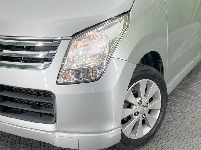 ワゴンＲ ＦＸリミテッドＩＩ　禁煙車　スマートキー　純正１４インチアルミ　オートエアコン　ＣＤ　プライバシーガラス　ドアバイザー　ヘッドライトレベライザー　シートアンダートレイ　パワーウィンドウ（11枚目）