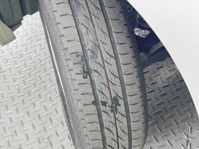 ワゴンＲ ＦＸリミテッドＩＩ　禁煙車　スマートキー　純正１４インチアルミ　オートエアコン　ＣＤ　プライバシーガラス　ドアバイザー　ヘッドライトレベライザー　シートアンダートレイ　パワーウィンドウ（26枚目）